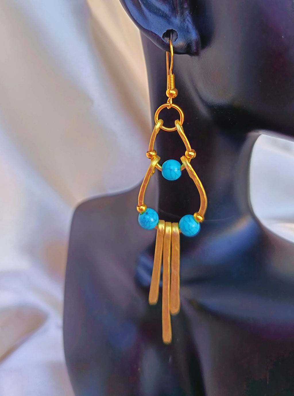 Orecchini in ottone Horus